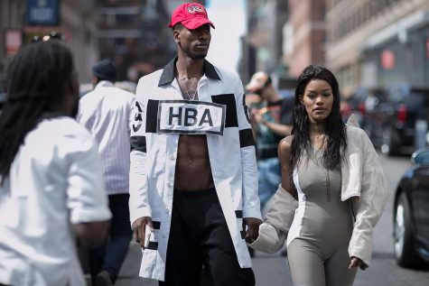 Professional basketball player Iman Shumpert and his fiance', actress Teyana Taylor, in Hood by Hair designs at New York Fashion Week 2016. Taylor modeled in Kanye West's Yeezy 2017 season showcase during the week's festivities. 