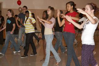 Students step into, learn tango manners 