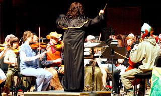 Orchestra performing Fright Night in costume 