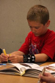 Children learn about rock, snowflake crystals 