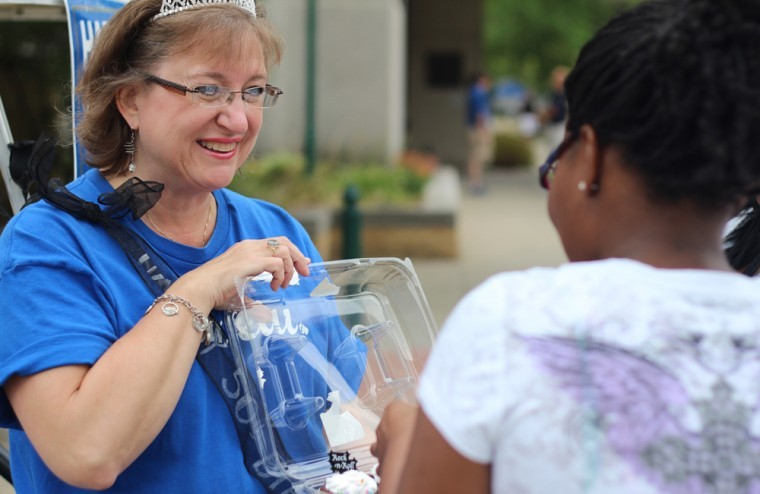Photo: Staff member gives treats, advice on move-in day
