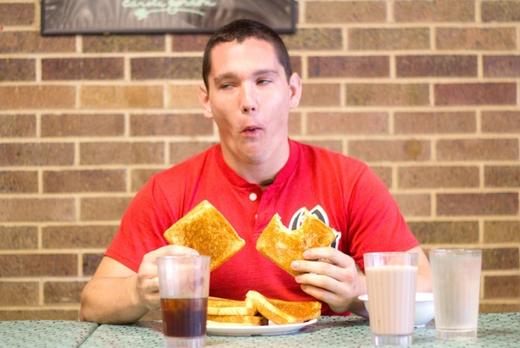 Photo: Student downs 9 sandwiches, wins contest