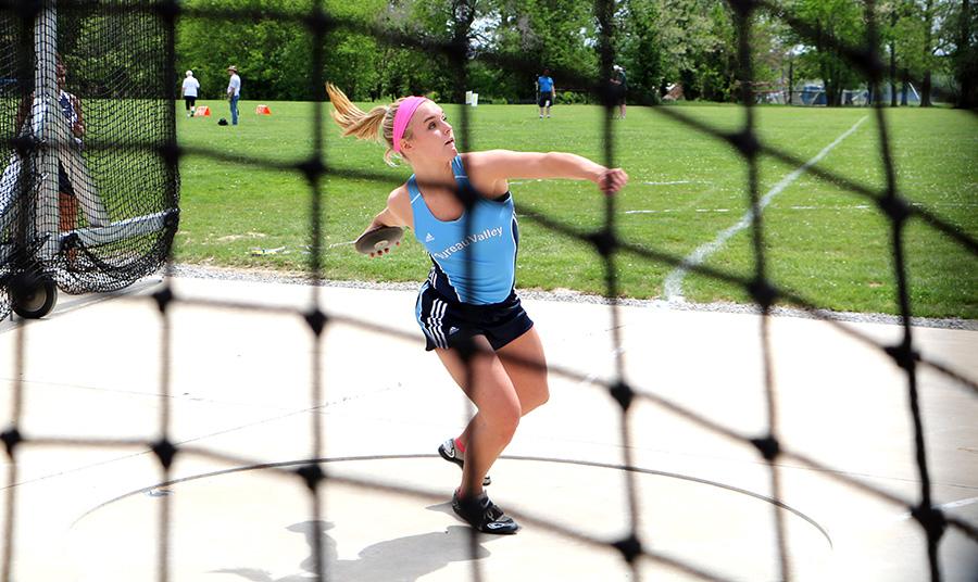 Sydney Lebahn, a junior at Bureau Valley High School, practices throwing the discus during the class 1A semifinals at the IHSA Girls State Final Track Meet Thursday at O’Brien Stadium. Lebahn threw a qualifying throw of 113 feet, 7 inches.
