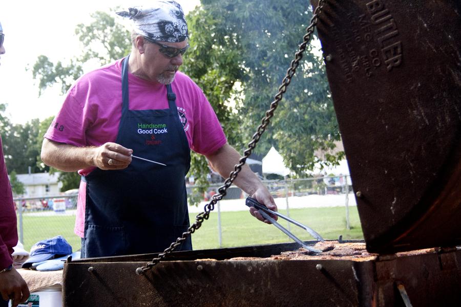 Local man grills out during the Red White and Blue celebration at Morton Park.