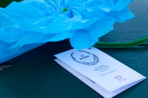 Detail shot of a Blue flower handed out at the celebration