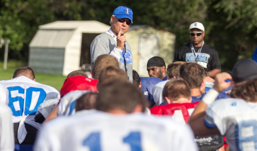 Jason Howell | The Daily Eastern News

Coach Kim Dameron gives a speech to his players at the end of practice on Thursday near OBrien Field.  The Panthers first football game is Aug. 28 versus the Minnesota Gophers.