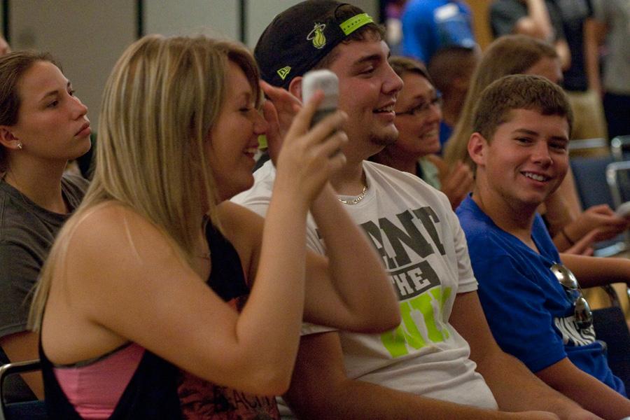 Chynna Miller | The Daily Eastern News 
Kenzie Kistner, a freshman psychology major, and Michael Smith, a freshman athletic training major, react after answering a question during a pop-culture trivia game, Think Fast, at Up All Nite Friday in the Martin Luther King Jr. University Union. 