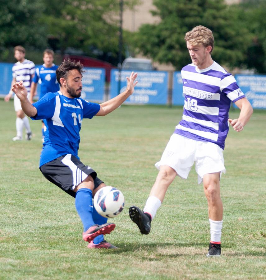 Senior Will Butler battles for possession of the ball with Lipscomb’s Matt Kerridge, during Eastern’s game Monday at Lakeside Field. The Panthers lost 2-1 and dropped to 1-1 on the season.