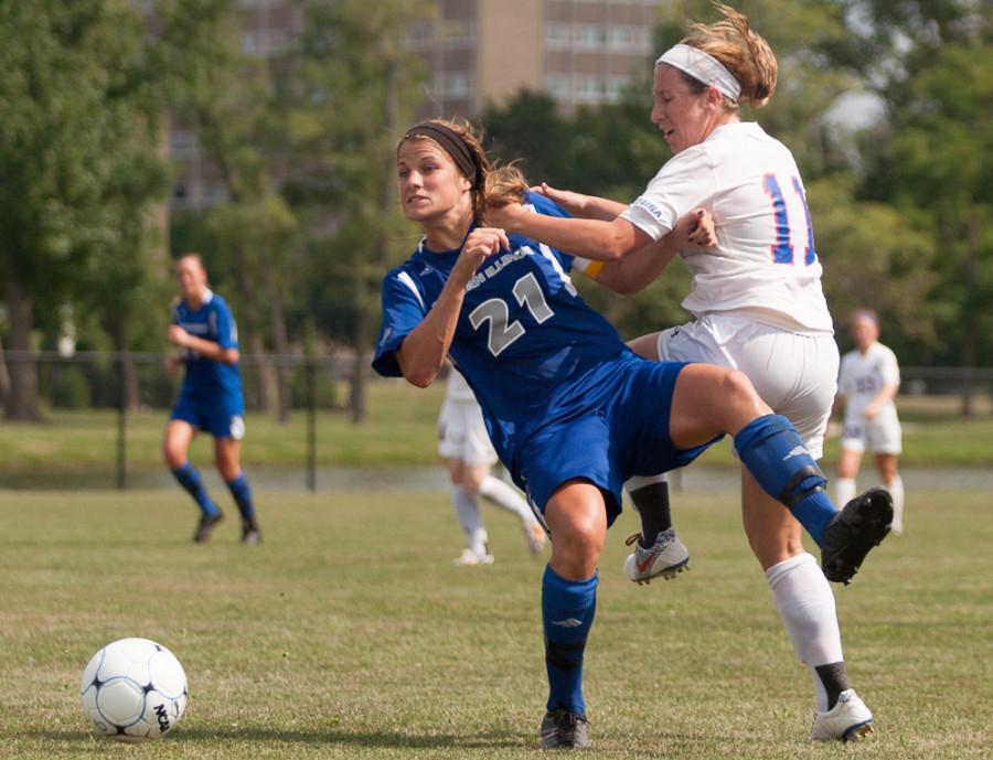 Senior midfielder Meagan Radloff fights with defender Taylor Dennis in a game against Louisiana Tech on Sunday at Lakeside Field.  The Panthers lost to the Bulldogs 3-1.  Radloff had three shots and one assist in the game.  The Panthers are 0-4 overall.