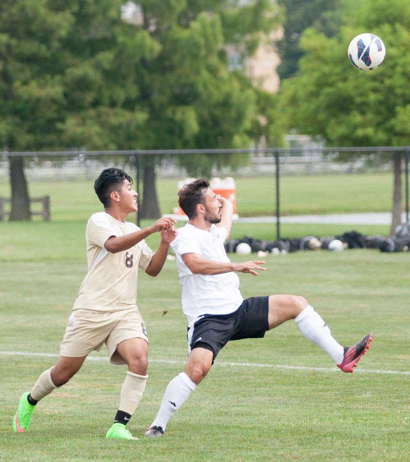  Senior midfielder Will Butler attempts to keep possession of the ball in a game on Aug. 30 at Lakeside Field.  The Panthers beat St. Francis 2-0.  Butler scored the first goal in the game.