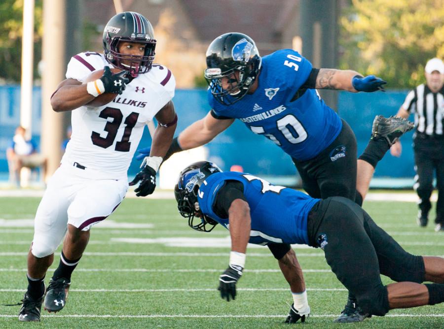 Jason Howell | The Daily Eastern News
Senior runningback Malcolm Agnew avoids the tackle by Easterns defense in Eastern footballs home opener on Saturday at OBrien Field.  The Panthers lost to the Salukis 38-21.