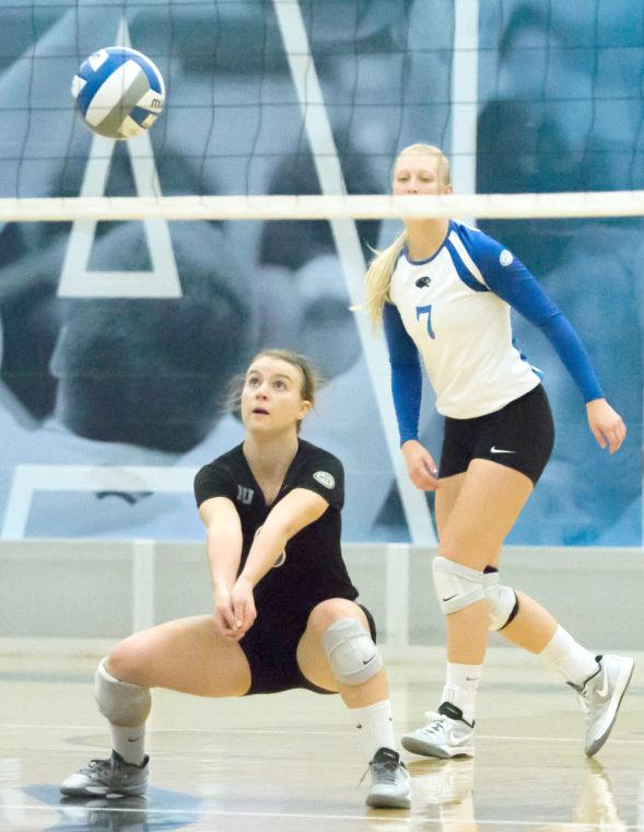 Junior libero Stephanie Wallace makes a play in a game on Oct. 5 in Lantz Arena.  The Panthers beat the Tennessee State Tigers 3-1.