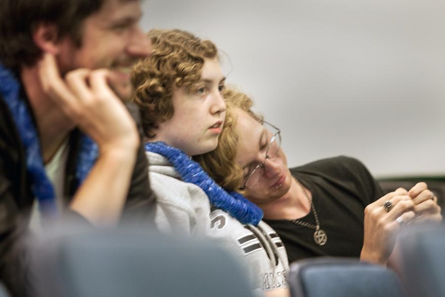 Destiny Rose, a freshman computer sciences and mathematics major leans on girlfriends, Hannah Kelly, a freshman theater arts major, shoulder during a Pride meeting Monday in the Charleston/Mattoon Room of the Martin Luther King Jr. University Union. Kelly told the story of their relationship. The two have been together since they were 13.