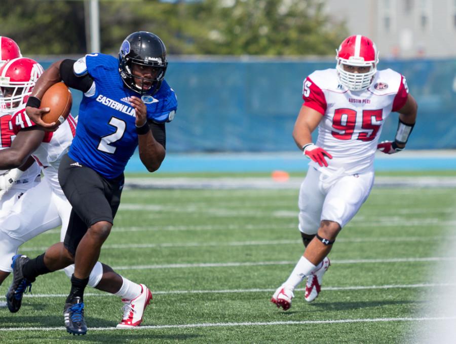 Junior quarterback Jalen Whitlow runs with the ball down  field against Austin Peay Saturday at OBrien Field. Whitlow set an Eastern record, with 137 rushing yards by a quarterback, as the Panthers won 63-7.