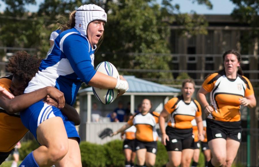 Senior lock Ellen Wilson is grabbed from behind during a game on Sept. 27 against Tennessee at Lakeside Field.  The Panthers beat the Volunteers 31-17.  After losing 61-0 to Life on Saturday, the Panthers are now 1-3 overall.