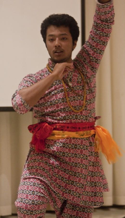 Sunrose Maskey, a freshman psychology major performs a Napali dance to Shakiras Waka Waka song Friday evening for Sounds of the World.