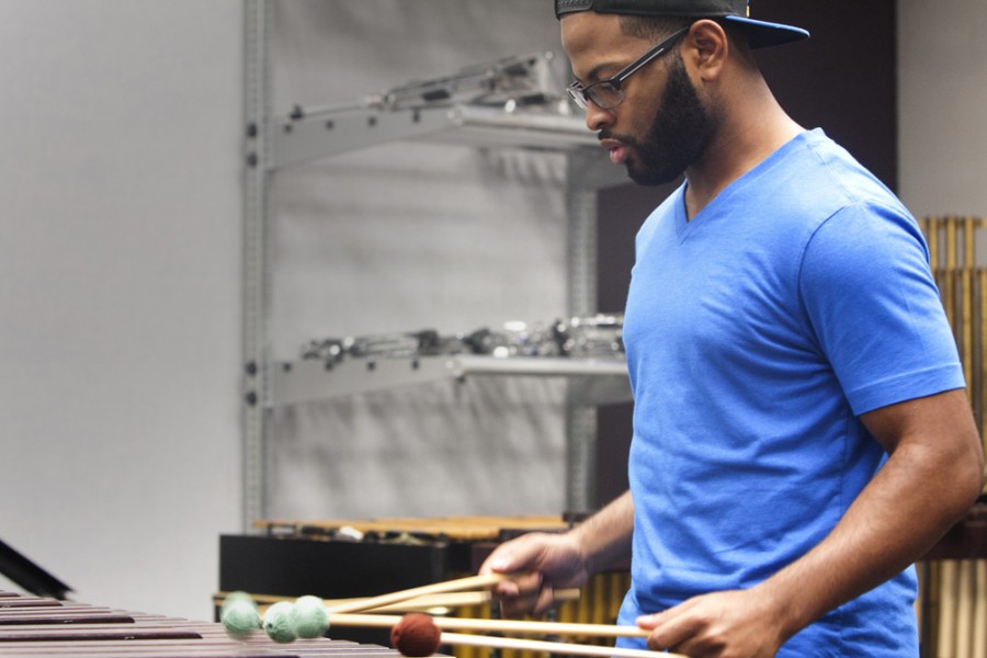 Mike Amos, a junior music education major, practices the xylophone Tuesday inside The Doudna Fine Arts Center.