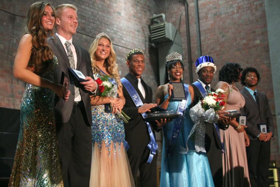 Chynna Miller| The Daily Eastern News
 The runner up and the newly crowned homecoming court pose for photo after the Homecoming Coronation Cermony Monday in McAfee Gymnasium. In order from left to right: Samantha DeYoung, James Smith, Catie Witt, Tylen Elliot, Alexis Lambert, Brandal Miles, Brittany Fisher and Stephen Simpson.