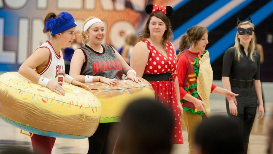 Jason Howell | The Daily Eastern NewsEastern students participated in a costume contest during Blue Madness on Thursday in Lantz Arena.  In addition to the contest, area children trick or treated and the Eastern mens and womens basketball teams were introduced.