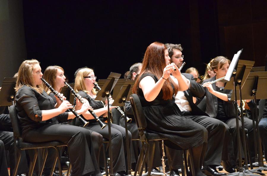 Musicians in the woodwinds section play during A Call to Duty: A Veteranss Day Tribute on Thursday in the Dvorak Concert Hall of the Doudna Fine Arts Center.