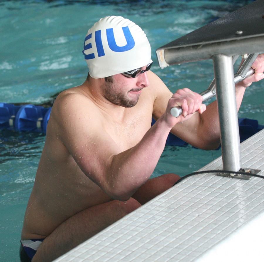 Freshman swimmer Patrick Wood gets into position to begin a race against the Valparaiso mens swim team on Nov. 14.
