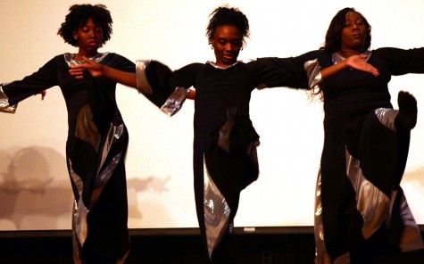 Ke’Ana Lampkins(Left), Tania Stanford(Middle), and Elizabeth Bailey(Right) perform a praise dance during the Martin Luther King Jr. Celebration and Candle Light Vigil Monday at the Martin Luther King Jr. University Union in the Grand Ballroom.
