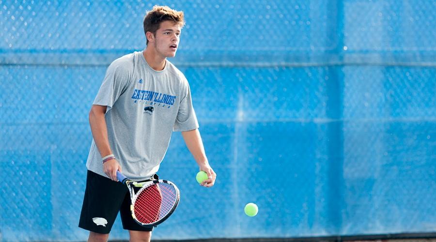 Freshman Grant Reiman prepares to serve the ball during tennis practice on Sept. 30.