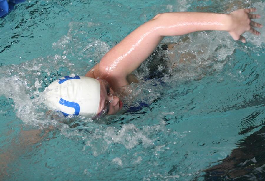 Bridgette Bowen, junior psychology major, performs a freestyle stroke for the womens EIU swim team.
