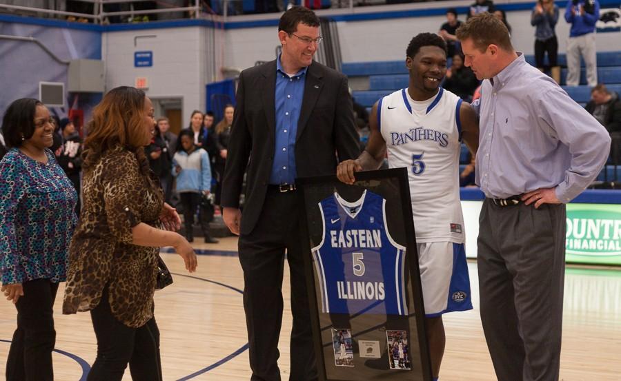 Senior+guard+Reggie+Smith+shares+a+hug+with+Eastern+coach+Jay+Spoonhour+as+graduating+seniors+are+recognized+after+the+Panthers+73-65+win+over+the+Southeast+Missouri+Redhawks+on+Sunday+at+Lantz+Arena.++Smith+averaged+7.3+points+per+game+over+26+games+played+during+his+career+at+Eastern.