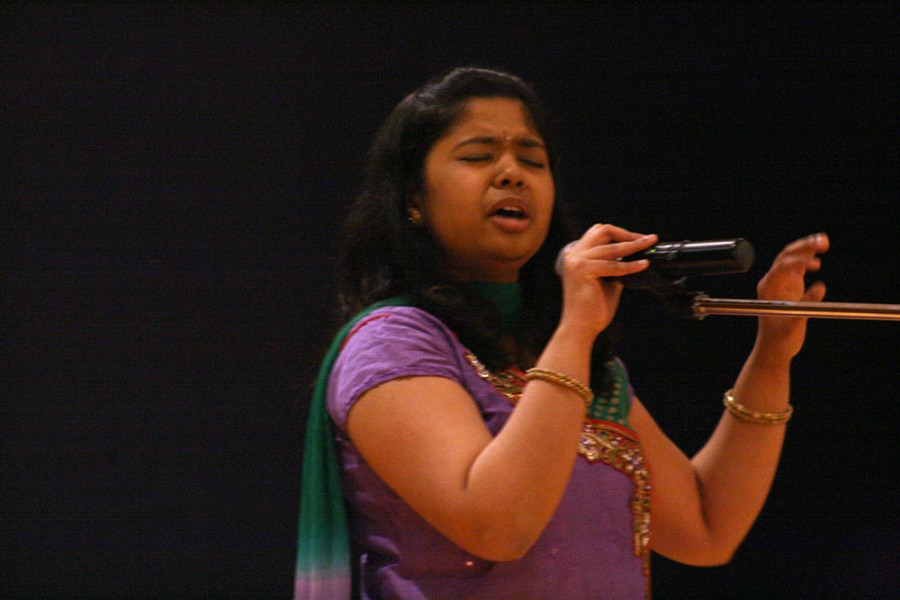 Deepthi Masabdar, an engineering major, performs an Indian song during Sounds of the World Friday in the University Ballroom in the Martin Luther King Jr. University Union.