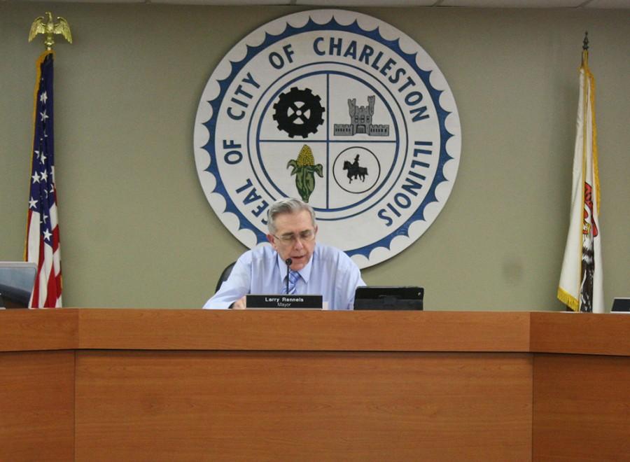 Larry Rennels, the Charleston city mayor, begins the city hall meeting on Tuesday at the City Hall in Charleston.
