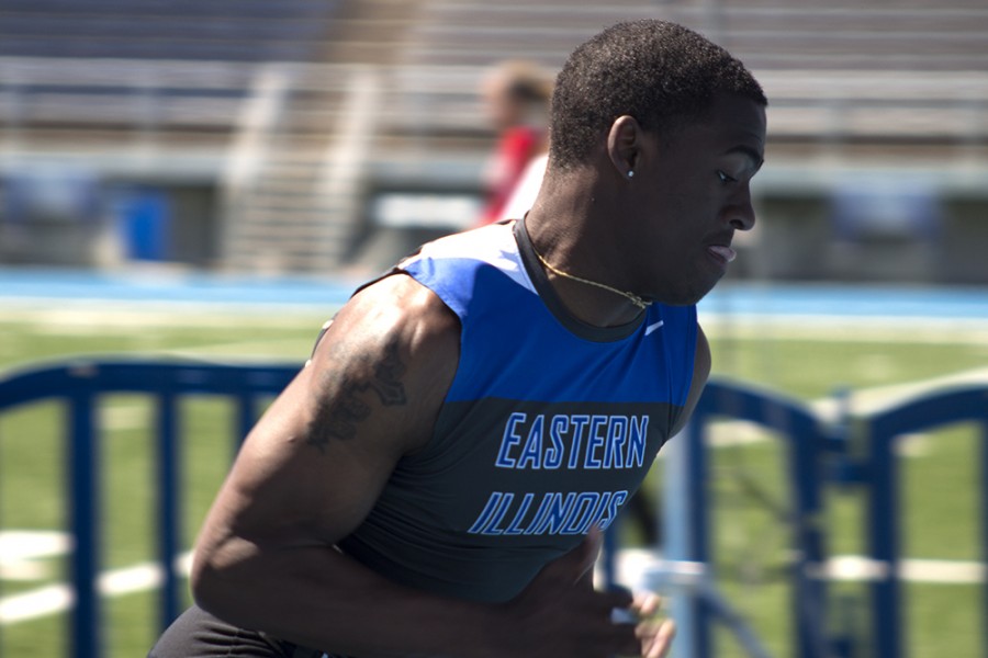 
Sophomore sprinter Jamal Robinson run after receiving the baton during the EIU Big Blue Classic track meet April 4 in O’Brein Stadium.