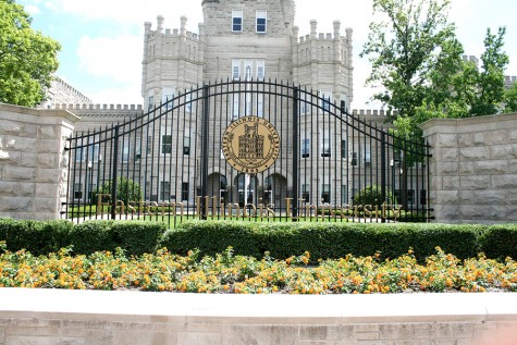 The gates of the castle outside of Old Main could be seen Wednesday afternoon where the Lantanas are in bloom. Part of Levi Lee’s job as Grounds Gardener is selecting the annual flower beds. He is in charge of selecting the plants for different areas across campus from Old Main to Greek Court.