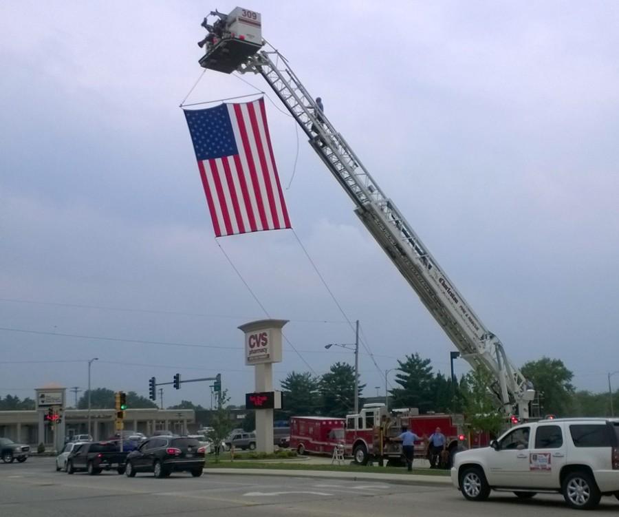 An American flag was raised above E street by CFD to tribute fallen veterans for the Vietnam traveling wall on July 1.