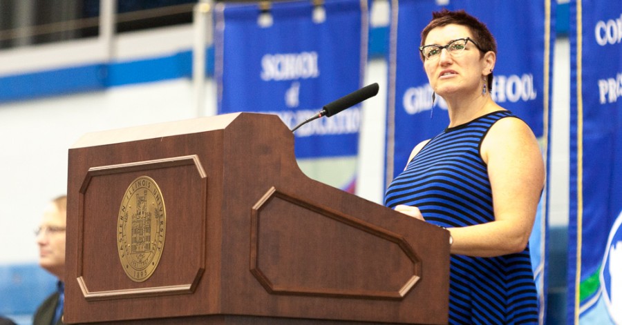 Womens+studies+coordinator+and+2015-2016+faculty+laurete+Jeannie+Ludlow+delivers+a+speech+to+new+students+during+convocation+on+Aug.+21+in+Lantz+Arena.++Ludlow+told+students+to+claim+power%2C+claim+knowledge+and+to+claim+their+education.
