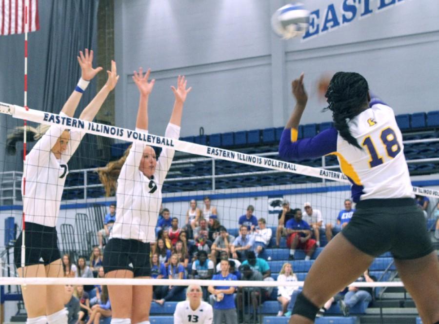 Freshman hitter Taylor Smith and sophomore hitter Allie Hueston attempt to block the hit from sophomore hitter Kellie Williams of Tennesee Tech in the third set of the Panthers first conference game of the season Friday inside Lantz Arena.