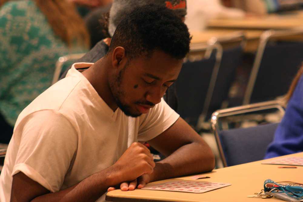 Kendall Barnes, a sophomore Kinesiology major plays bingo during ROCfest in the Grand Ballroom of the Martin Luther King, Jr. University Union on Monday. When asked about the bingo game Barnes replied, “It’s getting intense!”