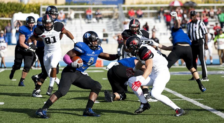 Red-shirt junior running back Devin Church blocks Southeast Missouri States Josh Freeman on a run up the field during the Panthers 33-28 Family Weekend win on Saturday at OBrien Field. Church ran for 75 yards completing one touchdown during the game.