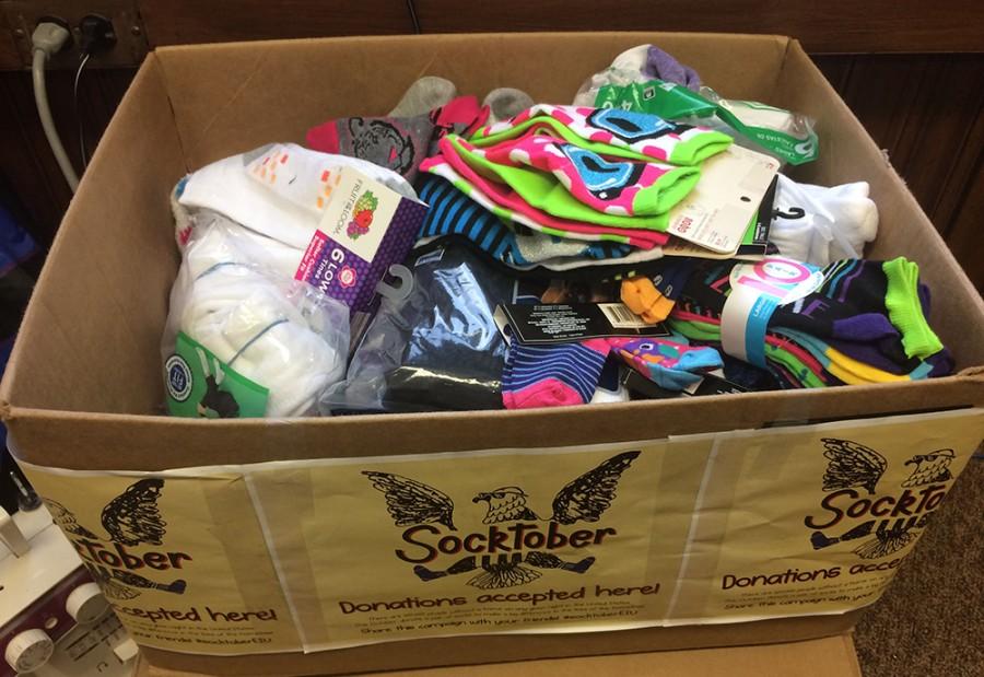 Student Community Service Office along with others around campus have been collecting socks since the middle of October and  will continue to do so until November 9, 2015.  They are collecting socks on behalf of the homeless, with boxes in various locations about campus.