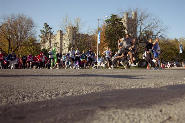 Submitted photo
Attendees run past Old Main during the 2013 Homecoming Race.