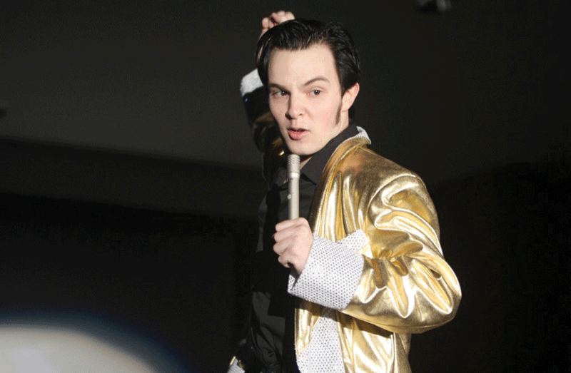  Tanner Skym, a freshman history major, impersonates Elvis at the Vegas event  on Nov. 12, 2014 at Grand Ballroom in the Martin Luther King Jr., University Union.