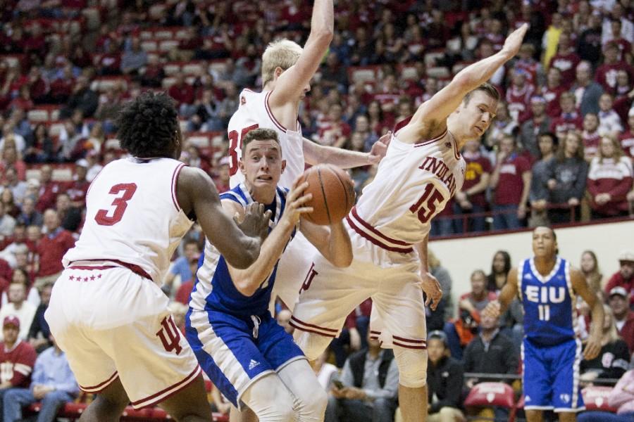 Freshman forward Patrick Muldoon goes up for a shot surrounded by Hoosiers during the Panthers 88-49 loss to Indiana on Friday in Bloomington, Ind.