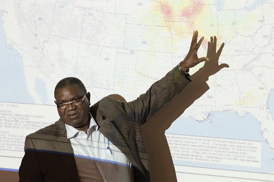 Dr. Francis Odemerho, a professor of geography at Southern Illinois University Edwardsville lectures about erosion Monday in the physical science building in observance of National Geography Awareness Week.