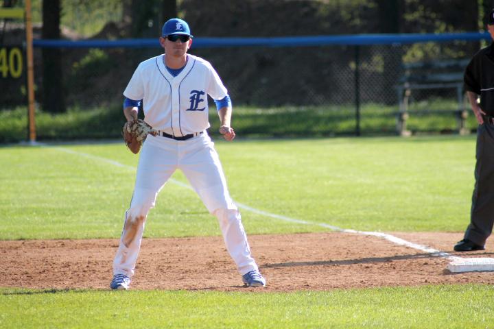 Former first baseman and left hand pitcher Adam Casson readies himself while a batter from St. Louis gets ready for the pitch on April 28th, 2015.