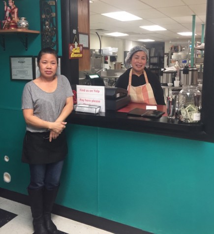 Co-owners Mappaka Pounginjui and Juthamas Wangmhne greet incoming customers Sunday at their resturant Siam Thai's Kitchen.