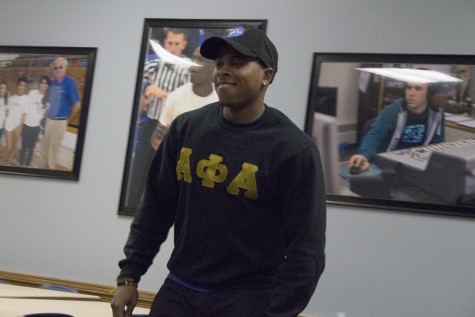 Phil Love a senior political science major auditions to model for the African Student Association’s fashion show on Tuesday in the Casey Room of the Martin Luther King Jr University Union.