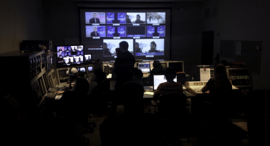 Students man the control room during a broadcast of NewsWatch on Dec. 16, 2015. 