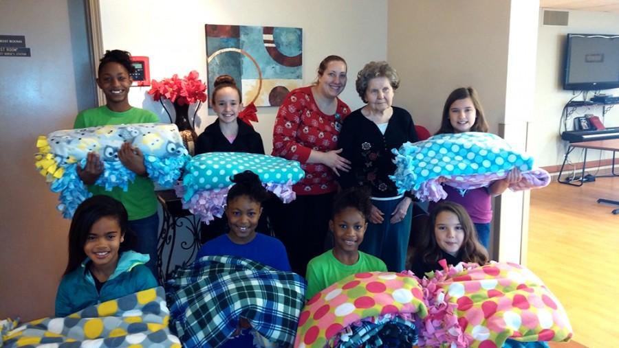 Submitted Photo | The Daily Eastern News
Jefferson Elementary School Girls on the Run members deliver blankets they made to Hilltop Skilled Nursing and Rehabilitation Center.