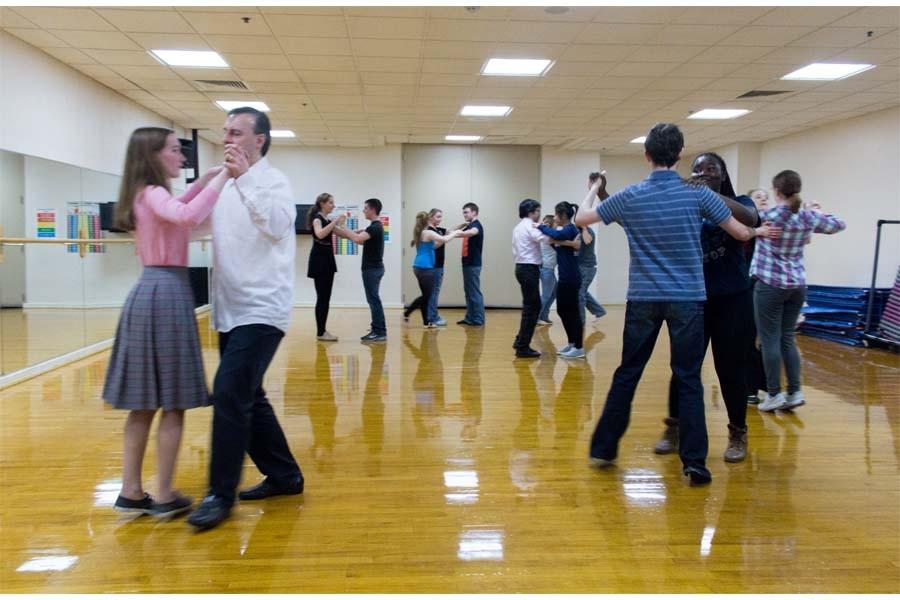 Jason Howell | The Daily Eastern News
Members of the EIU Ballroom Dance Society practice the Waltz Tuesday night in the Dance Studio of the Student Recreation Center. 
