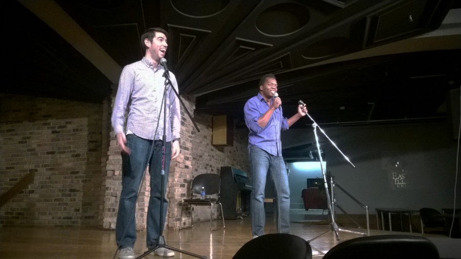 Esteban Gast and Iggy Mwela, Cometry artists, perform a stand-up routine Friday in the 7th Street Underground of the Martin Luther King Jr. University Union. The group performed a mixture of comedy and spoken word routines as part of their unique performance.